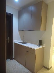 Η κουζίνα ή μικρή κουζίνα στο فندق الأمل العربية