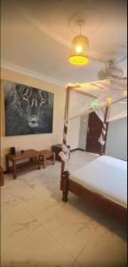 Ένα ή περισσότερα κρεβάτια σε δωμάτιο στο Zazu Beach House +8 φωτογραφίες