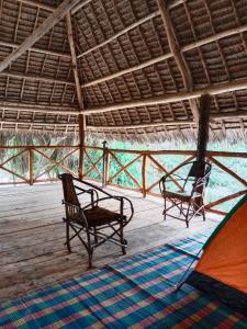 Photo de la galerie de l'établissement Zazu Beach House, à Nungwi