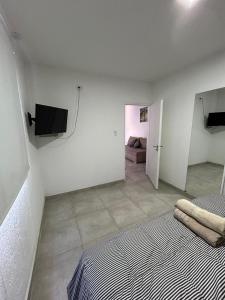 Μια τηλεόραση ή/και κέντρο ψυχαγωγίας στο Complejo de departamentos H&H