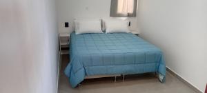 Postel nebo postele na pokoji v ubytování Don Alberto Departamento 2