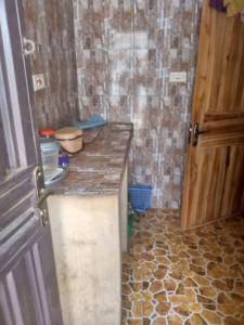 Η κουζίνα ή μικρή κουζίνα στο Ikorodu Apartment