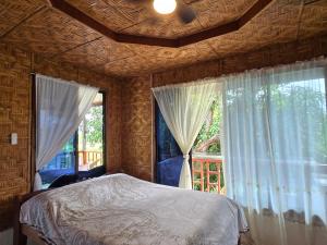 Ένα ή περισσότερα κρεβάτια σε δωμάτιο στο Cruisers Villa Ysay 2 +3 φωτογραφίες