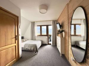 Postel nebo postele na pokoji v ubytování Dom na Wierchu