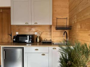 Kuchyň nebo kuchyňský kout v ubytování Dom na Wierchu