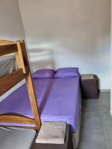 Postel nebo postele na pokoji v ubytování Ca'n Charlie