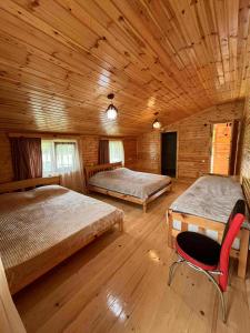 Postel nebo postele na pokoji v ubytování Eco Chalet Mestia