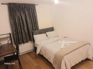 Postel nebo postele na pokoji v ubytování Cozy room 1