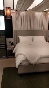 Ένα ή περισσότερα κρεβάτια σε δωμάτιο στο Tranquil Stay