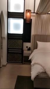 Ένα ή περισσότερα κρεβάτια σε δωμάτιο στο Tranquil Stay