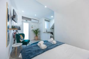 Postel nebo postele na pokoji v ubytování Almas 20 Casa Praia Apartamentos