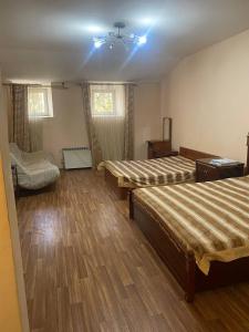 Postel nebo postele na pokoji v ubytování Апартотель Центр