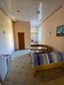 Posezení v ubytování Апартотель Центр + 25 fotografií