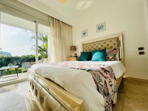 Postel nebo postele na pokoji v ubytování Paradise Pool Front and Beach Condo at Punta Cana + 139 fotografií