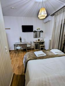 Postel nebo postele na pokoji v ubytování Joanna's House + 3 fotografie