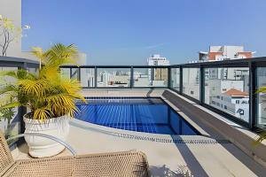 Бассейн в TOP quarto Stay Inn hotel 3 min Av Paulista или поблизости