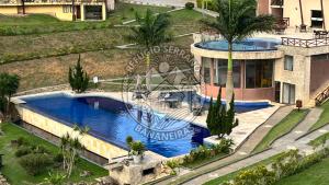 an aerial view of a house with a swimming pool at Refúgio Serrano Bananeiras in Bananeiras