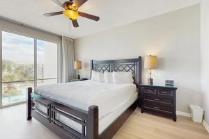 Ένα ή περισσότερα κρεβάτια σε δωμάτιο στο High Pointe 3333 +41 φωτογραφίες