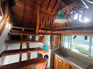 an overhead view of a kitchen in a tiny house at Cabaña El Jericoano in Jericó