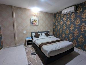 Postel nebo postele na pokoji v ubytování Luna Hotel & Lounge + 5 fotografií