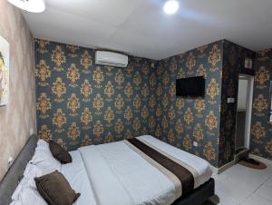 TV a/nebo společenská místnost v ubytování Luna Hotel & Lounge