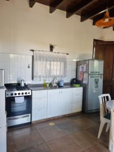 Kuchyň nebo kuchyňský kout v ubytování Casita Mumi