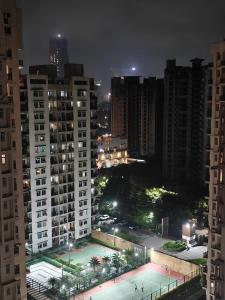 Nespecifikovaný výhled na destinaci Noida nebo výhled na město při pohledu z apartmánu