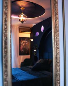 En eller flere senge i et værelse på Divine Blue Suite