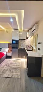 Η κουζίνα ή μικρή κουζίνα στο TTA apartments