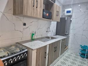 Η κουζίνα ή μικρή κουζίνα στο Une chambre salon avec cuisine