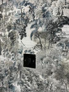 a wall with a painting of a forest at Charming Aldershot Home - Free Parking in Ash