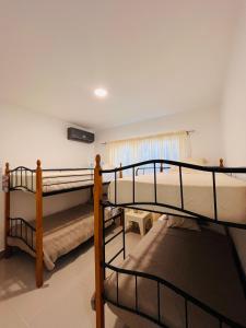 a room with two bunk beds in a room at Boho Vibes Punta Cana in Punta Cana