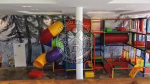 a childrens play room with a colorful playground at Refúgio Serrano Bananeiras in Bananeiras
