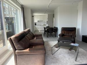 Istumisnurk majutusasutuses Stylish 3-bedroom apartment with sea view