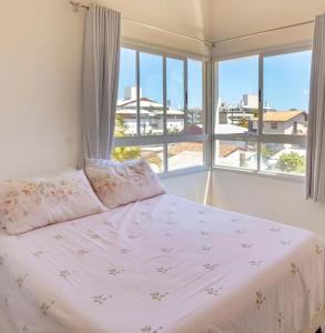 Voodi või voodid majutusasutuse Deixe a energia fluir e contaminar suas férias. toas