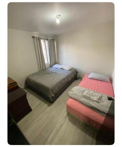 Ένα ή περισσότερα κρεβάτια σε δωμάτιο στο Casa llena de vida