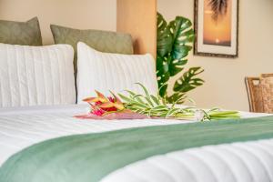 En eller flere senge i et værelse på Valley Isle Resort Unit 802 + 25 billeder