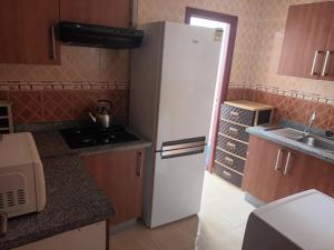 Η κουζίνα ή μικρή κουζίνα στο Oualidia résidence Ben zeroual