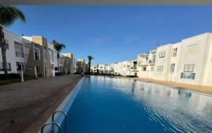 Bazén v ubytování Oualidia résidence Ben zeroual nebo v jeho okolí