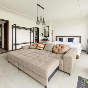 Ένα ή περισσότερα κρεβάτια σε δωμάτιο στο HillTop Homestay Đà Lạt