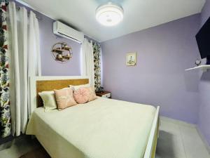 Postel nebo postele na pokoji v ubytování Affordable and Comfy Condo at Punta Cana + 114 fotografií