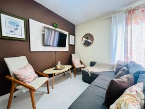 TV a/nebo společenská místnost v ubytování Affordable and Comfy Condo at Punta Cana