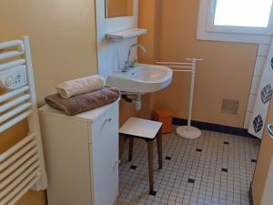 a small bathroom with a sink and a sink at Notre-Dame-de-Monts (85) - Appartement de vacances 50m² environ - 4 personnes - FR-1-540-204 in Notre-Dame-de-Monts +28 photos