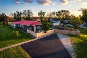 an aerial view of a house with a yard at Bourbon Blue - 8 min to Downtown Bardstown and Spacious! in Bardstown
