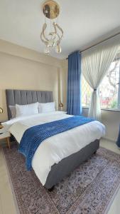 Postel nebo postele na pokoji v ubytování Secure Modern Ground floor 2Bedroom Apartment