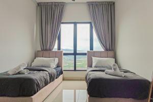 Postel nebo postele na pokoji v ubytování Comfort Loft at Tulip Denai Alam by HCK + 68 fotografií