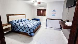 Postel nebo postele na pokoji v ubytování Hotel Casa Hidalgo