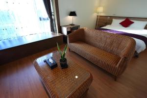 Postel nebo postele na pokoji v ubytování 雲起軒民宿 Cloudscape B&B