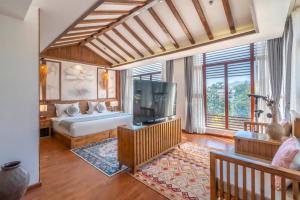 Giường trong phòng chung tại Floral Hotel Lijiang Old Town Xinjingjingju Boutique Inn