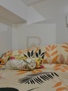 Ένα ή περισσότερα κρεβάτια σε δωμάτιο στο Rex Baguio Stays